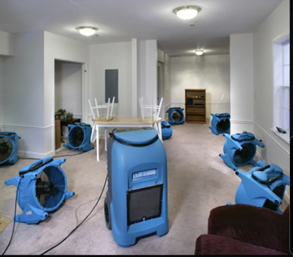 Air movers and dehumidifier setup for Water Damage Restoration in Cape St. Claire